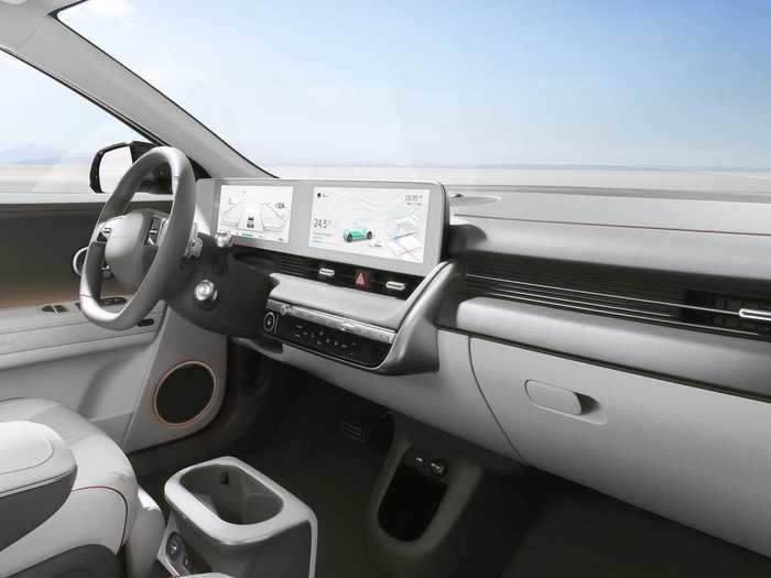 The interior is airy, spacious, and cleanly designed. It features a 12-inch infotainment screen and a 12-inch digital gauge cluster.