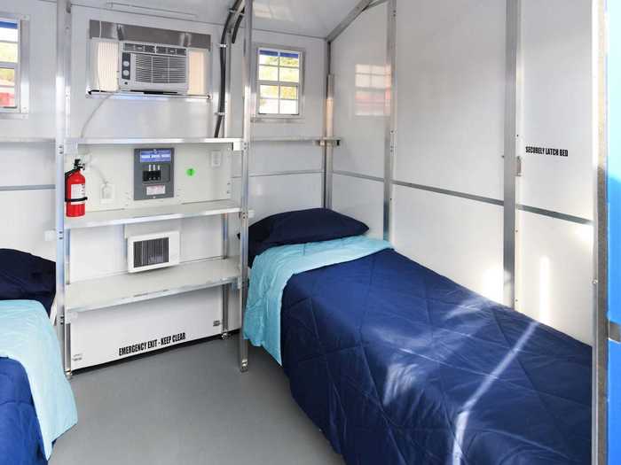 To create this sense of dignity, the shelters have similar amenities to any home, such as beds, shelves that can be used as desks, and a designated phone charging area.