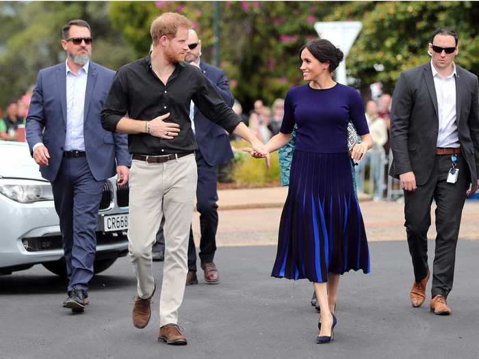 On the last day of her first 2018 royal tour, Markle chose a blue ensemble with matching Manolo Blahnik heels.