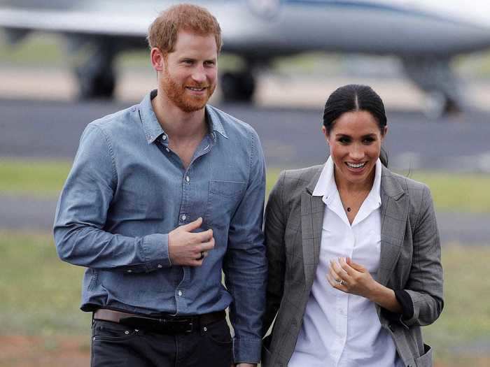 While visiting Australia in 2018, Markle opted for a casual look with a blazer, white button-up, black jeans, and matching ankle boots.