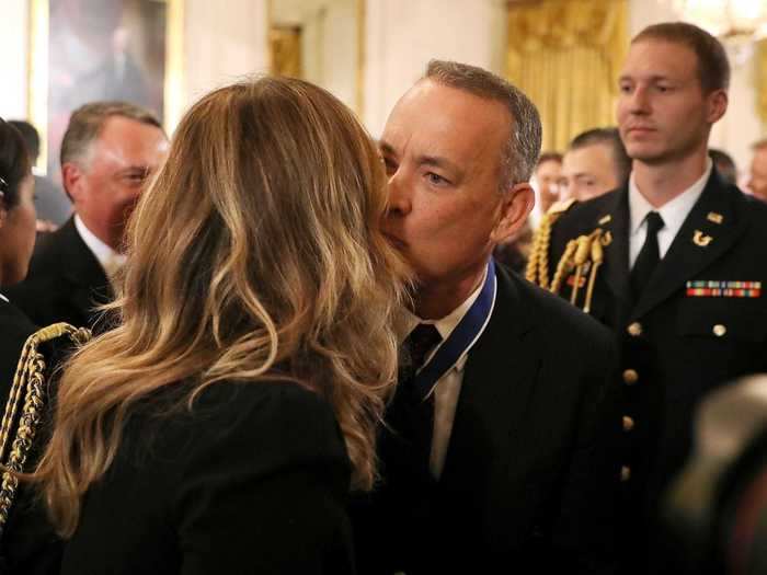 November 2016: Hanks kissed Wilson after receiving the Presidential Medal of Freedom.