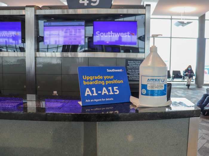 Houston is a Southwest stronghold and the airline has retrofitted its gate counters with plexiglass partitions and hand sanitizer. The gate signage still remained blank instead of highlighting the airline