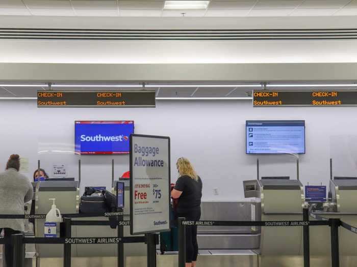 The airline was off to a good start as the check-in area had been overhauled to include plexiglass partitions and hand sanitizer dispensers.