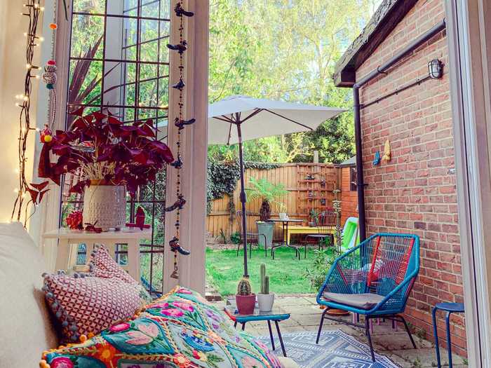 Back in the living room, a door opens to the yard.