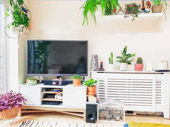 In the living room, Mello added wall shelves to display more of her collectibles.