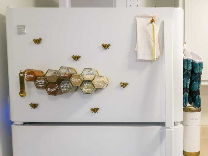 In the kitchen, Abraham used magnets to turn her freezer door into a spice rack, saving cabinet room for other items.