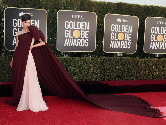 Sofia Carson brought the drama in a burgundy and pink dress.