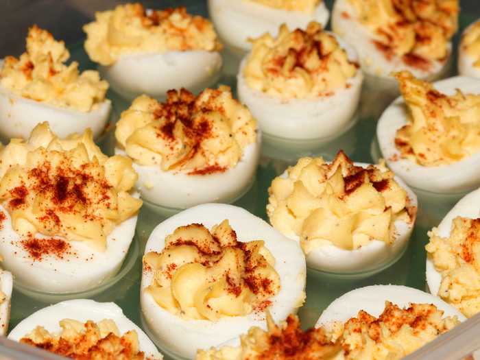 Deviled eggs are a staple.