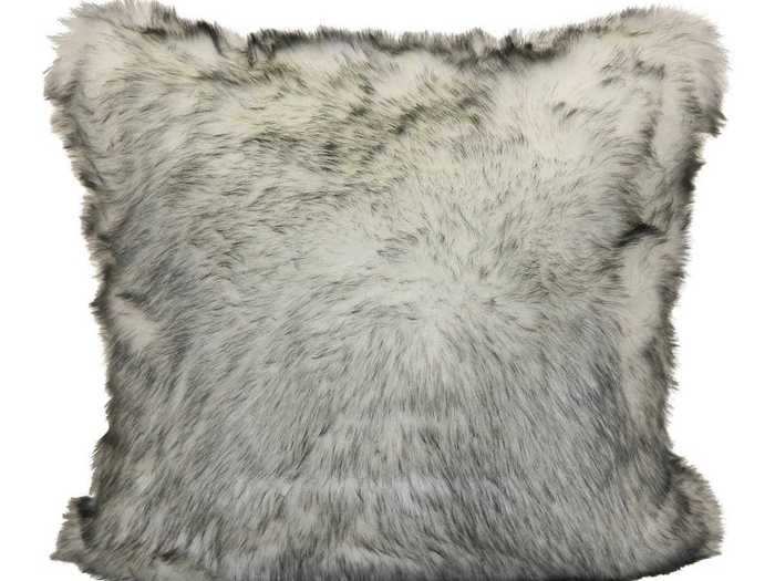 Make your space feel luxurious by incorporating faux-fur pillows into your home.