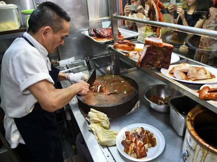 Chan wakes up early in the morning to prepare his marinade for the chicken.