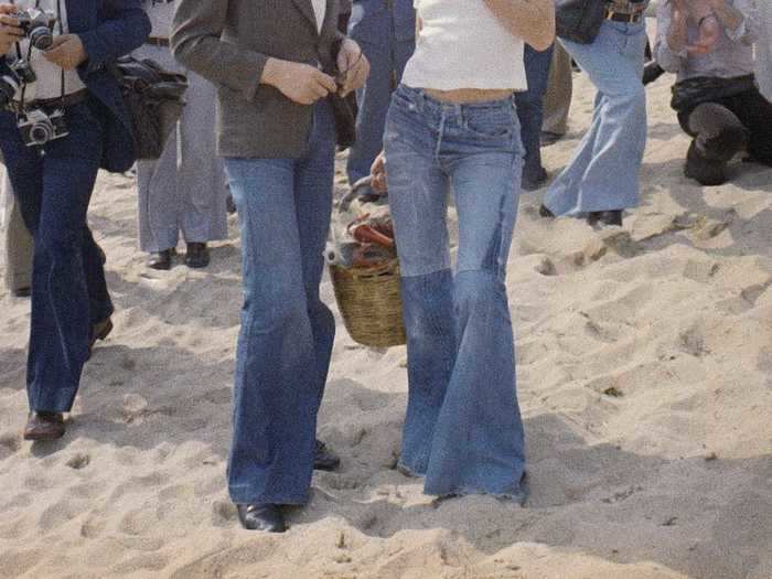 1964 - 1965: Jeans were tight at the waist and flared at the bottom.