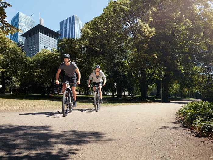 The carrier fits two e-bikes and you can still open the trunk with it installed.