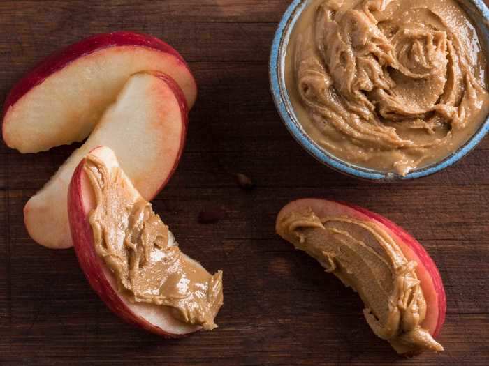 A snack like peanut butter and apple helps your recovery after the gym.