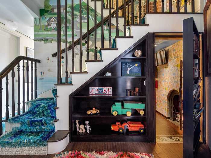 They also had a staircase built, which hides the entry into one of two playrooms for their kids, Winnie, 7, and Frances, 6. "I always like a secret bookshelf or a secret room," Fallon told The Wall Street Journal of the unique feature.