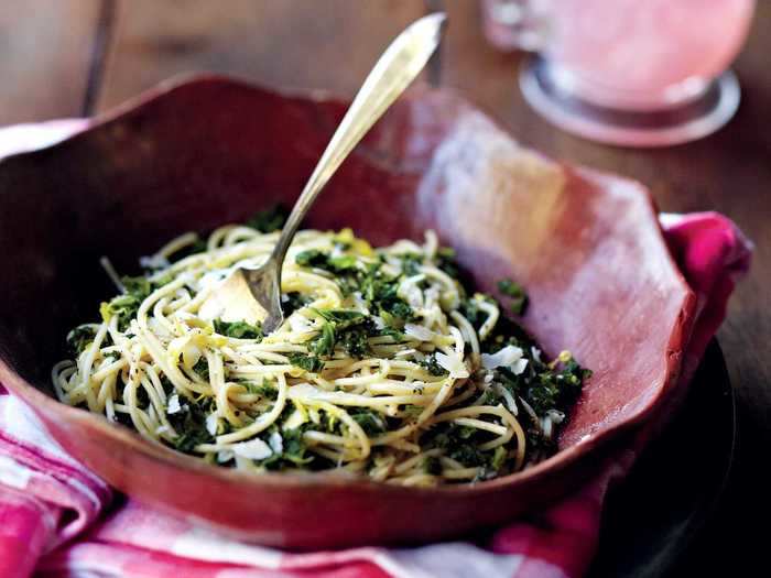 A nice and light spaghetti dish with garlic, lemon, kale, and parmesan will have you dreaming of spring.