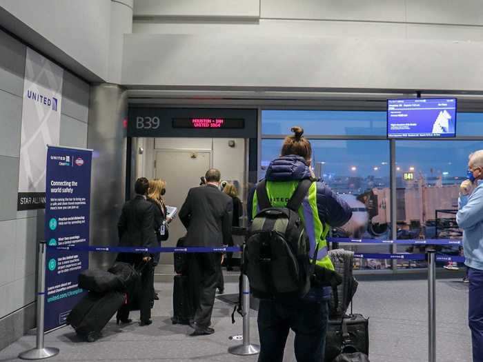 The gate area for my flight featured many of the same measures as check-in, including a banner reminding passengers to wear face coverings and social distance, as well as highlighting United