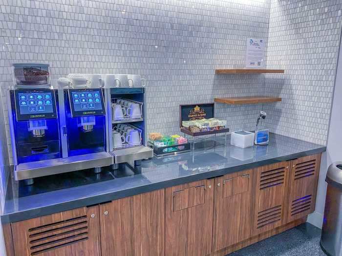 Coffee and tea can be found at one of these stations, spread across the lounge. An attendant will also serve the drinks as well.