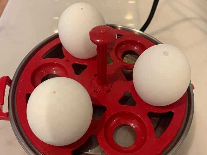 I made three hard-boiled eggs. They sit upright on the boiling tray, and the instructions say to let them cook for 12 minutes to get it just right.