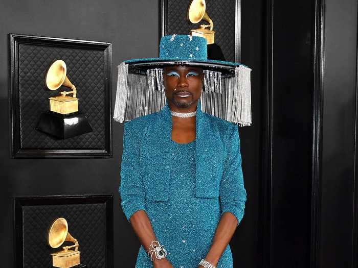 Billy Porter wore a remote-controlled fringed hat and matching fringed bodysuit on the 2020 red carpet.