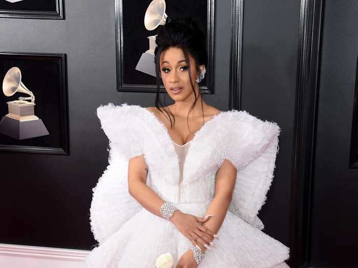 Cardi B made her Grammys debut in 2018, wearing a customarily bold white gown.