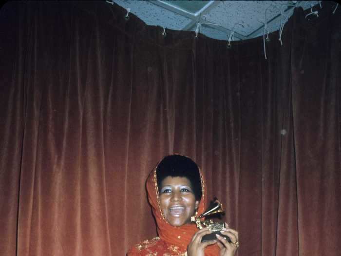 At the 1972 Grammys, Aretha Franklin looked spectacular in a head-to-toe orange ensemble.