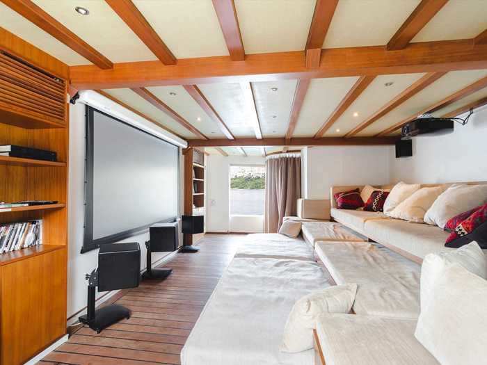 And of course, the cozy home cinema with multi-level seating.