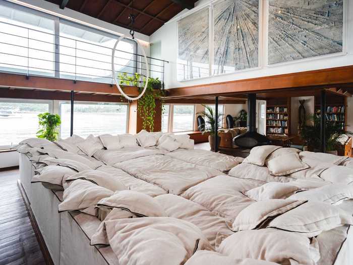 The living area houses what the listing refers to as the largest sofa in Hong Kong.