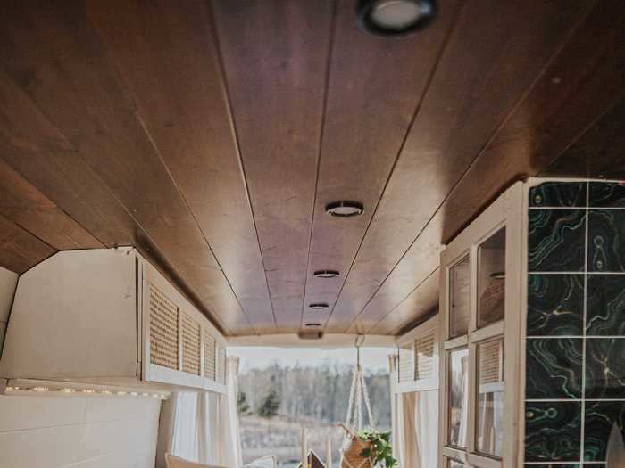 In the back of the vehicle, the couple built a sofa and a bed.