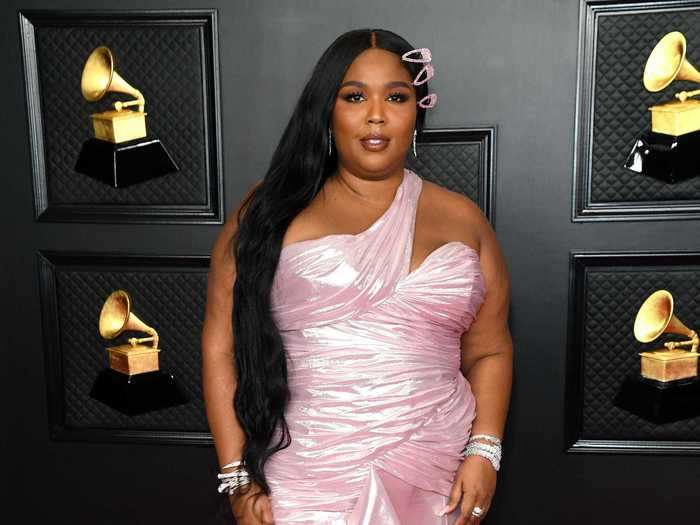 Lizzo changed into a pink dress with a ruffled asymmetrical skirt.