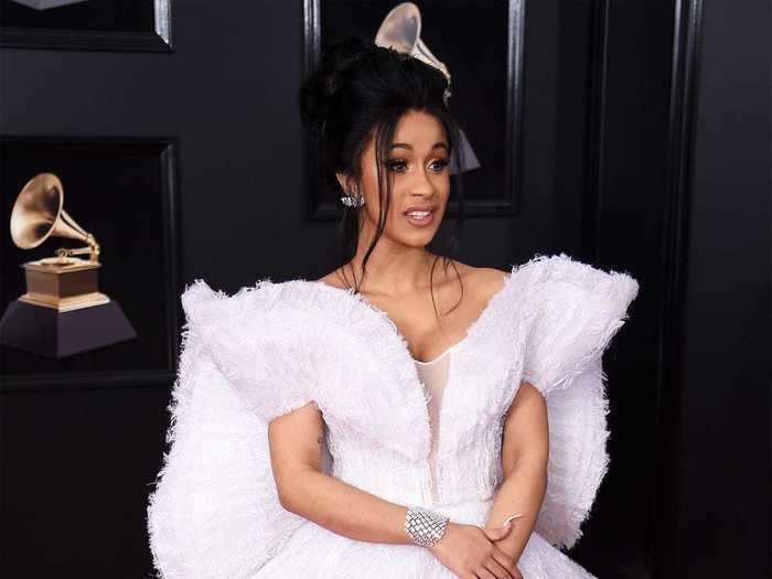 Cardi B turned heads at the 2018 Grammys, wearing a textured, tiered dress with a wing-like silhouette by the Saudi Arabian designer Ashi.