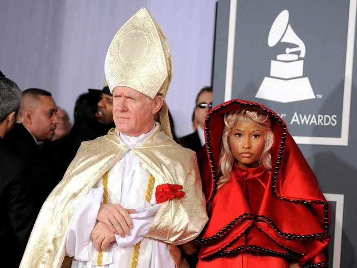 Nicki Minaj made quite the entrance that same year with a pretend Pope and a dress that looked like it was like something out of "The Handmaid