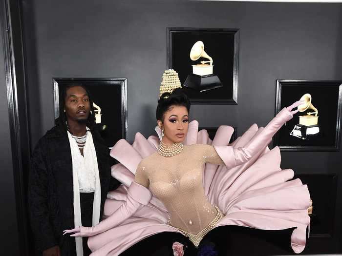 February 2019: Cardi B made a splash on the red carpet in a vintage Mugler couture bodysuit and dress that made her look like she was emerging from a shell.