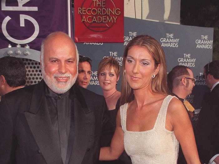 February 1999: Celine Dion walked the red carpet in a beaded white dress with a square neckline and a train of fabric before she received her two Grammys.