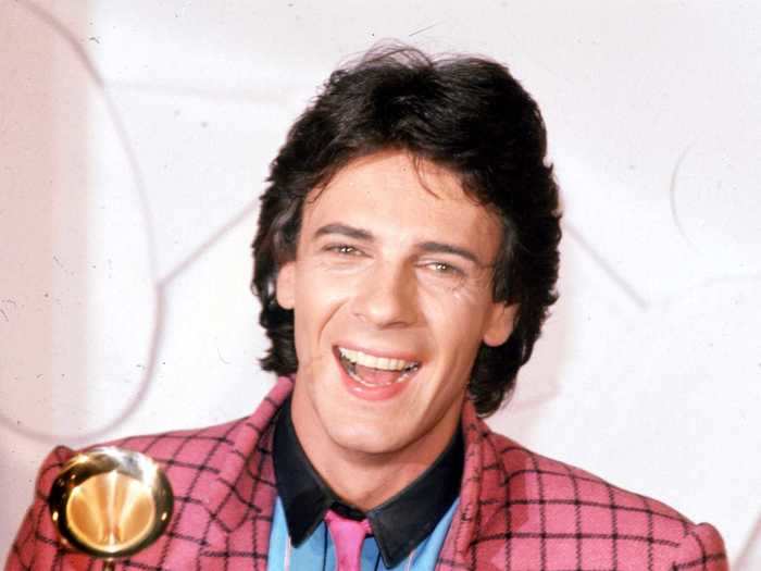 February 1982: Rick Springfield went bold in a pink checked blazer, a bright blue polo, and a neon pink tie.