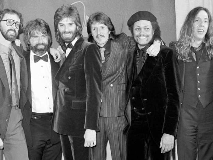 February 1980: The Doobie Brothers showed off a cool assortment of velvet, stripes, and everything in-between while collecting their two Grammy awards.