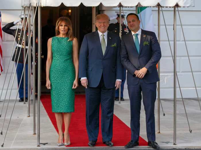 First lady Melania Trump wore a green animal print sheath dress designed by Brandon Maxwell to greet the prime minister of Ireland in 2018.