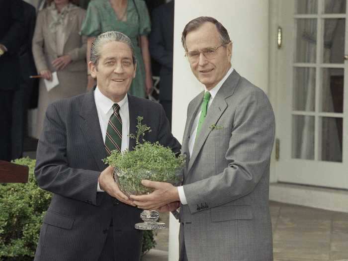 President George H.W. Bush received a bowl of shamrocks from deputy prime minister of Ireland Brian Lenihan in 1990.