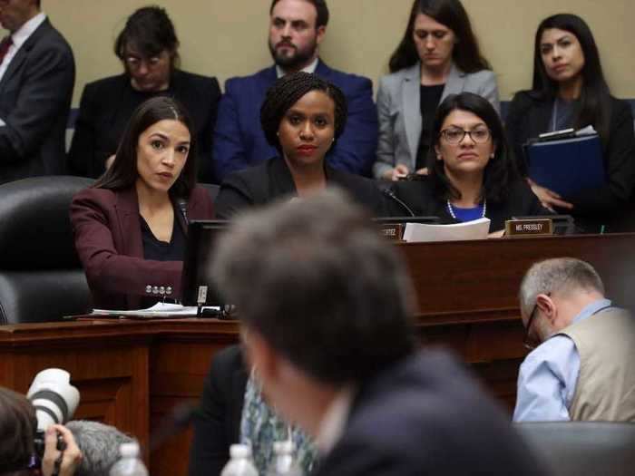 February 2019: Squad members Ocasio-Cortez, Pressley, and Tlaib sat together as Michael Cohen testified in front of the House Oversight Committee.