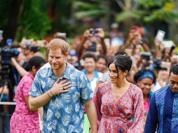 She wore a silk floral dress by Figue on her first royal tour with Prince Harry in Fiji in 2018.