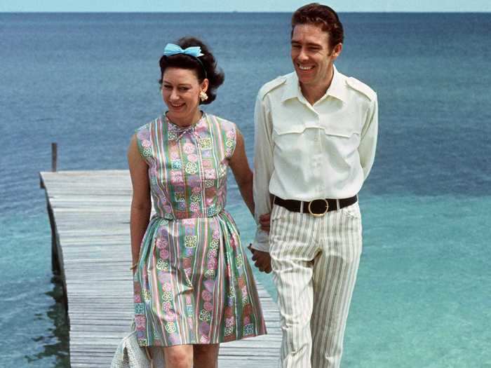 While visiting the Bahamas, Princess Margaret wore a colorful above-the-knee printed dress.