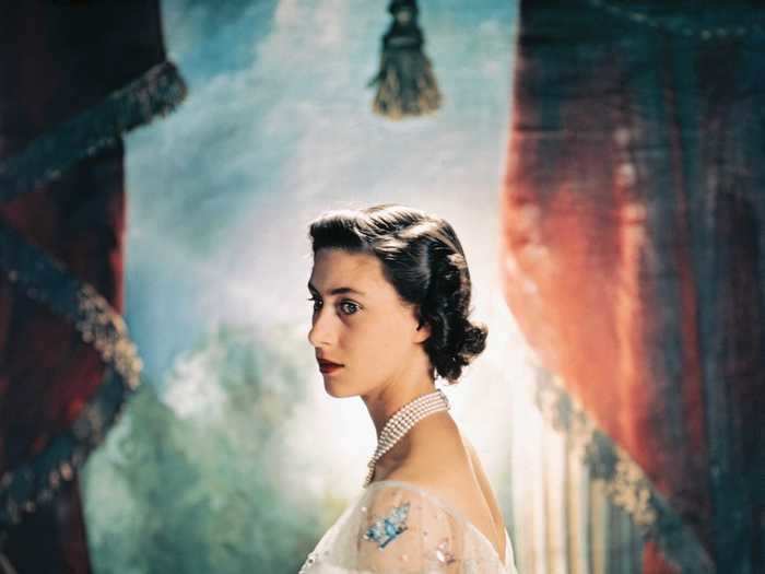 While sitting for a royal portrait, Princess Margaret stunned in a gauzy, white ballgown with sequined butterfly appliques.