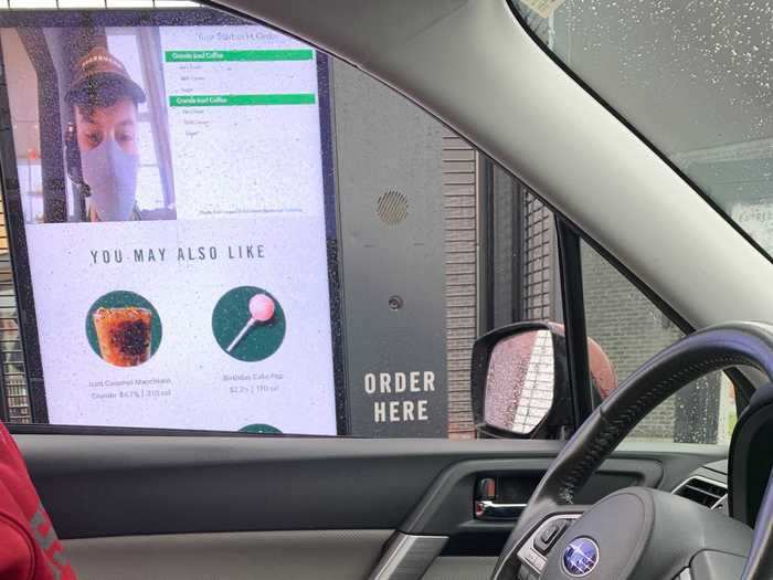 Starbucks continues to invest in drive-thru technologies, including digital screens with AI that can recommend items and make waits shorter.