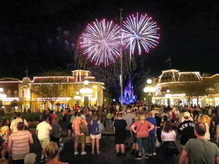 A woman was accused of choking a teenager after the latter blocked her view of a fireworks show.