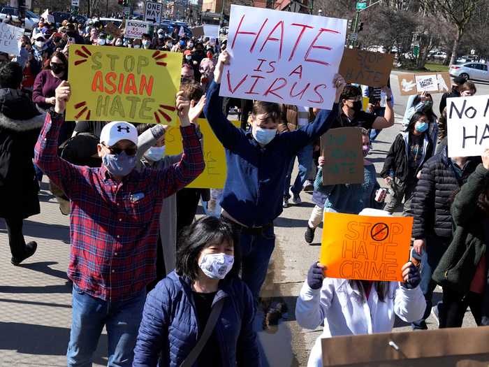 Protesters flooded the streets with signs, chanting and standing in solidarity with the Asian American and Pacific Islander community.