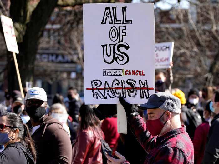 Crowds of demonstrators gathered at Logan Square monument in Chicago, Illinois Saturday.