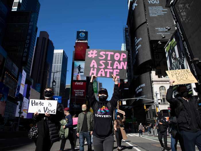 Hundreds of protesters in New York City marched from Times Square to Chinatown on Saturday.