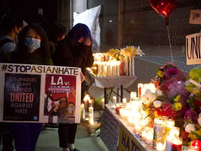 In Alhambra, California, people gathered at a vigil to pay tribute to those who lost their lives in Atlanta, according to the LA Times.