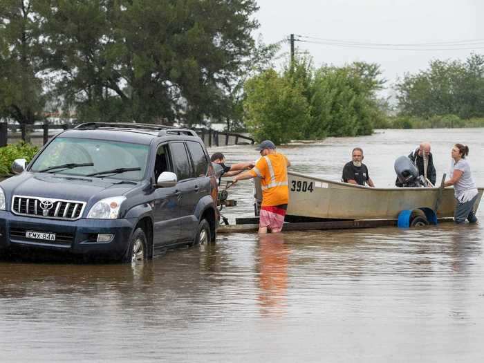 The floods caused delays in coronavirus vaccine shipments as the country expanded the category of people eligible to get vaccinated.