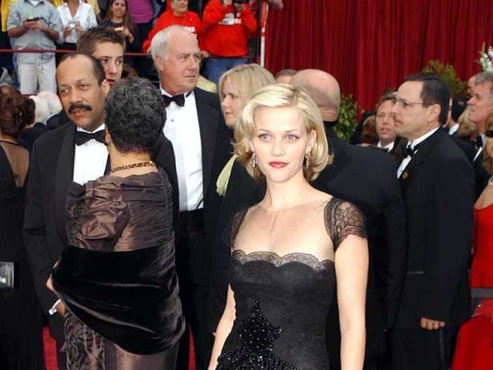 At her first Academy Awards, Witherspoon wore a laced black dress.