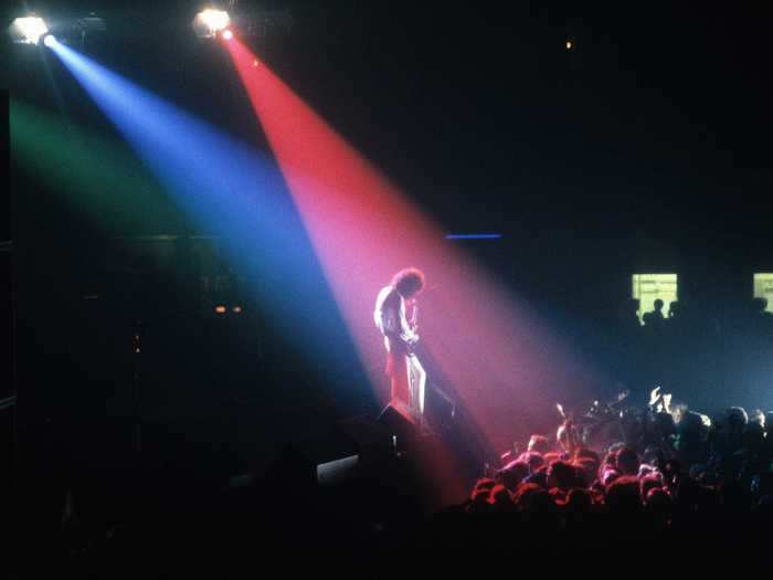 1984: Brian May takes a solo during a performance in the Netherlands.